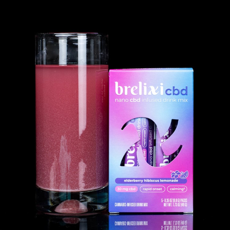 brelixi-lifestyle image with glass of cbd beverage and drink mix with nootropics